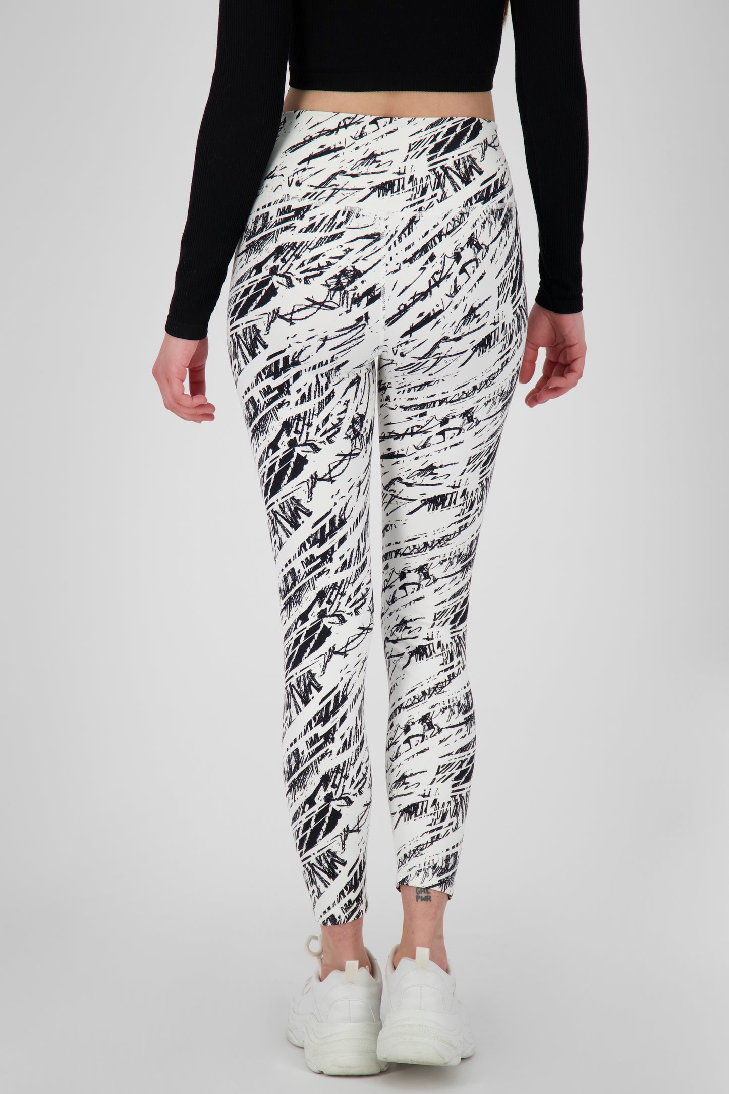 Alloverprint und sportliche Details: Die AriaAK Leggings für aktive Frauen Weiß