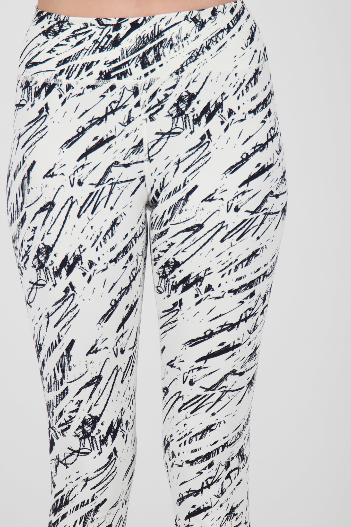 Alloverprint und sportliche Details: Die AriaAK Leggings für aktive Frauen Weiß