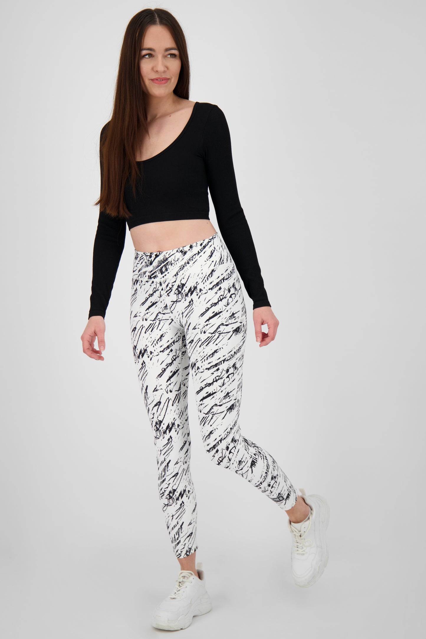 Alloverprint und sportliche Details: Die AriaAK Leggings für aktive Frauen Weiß